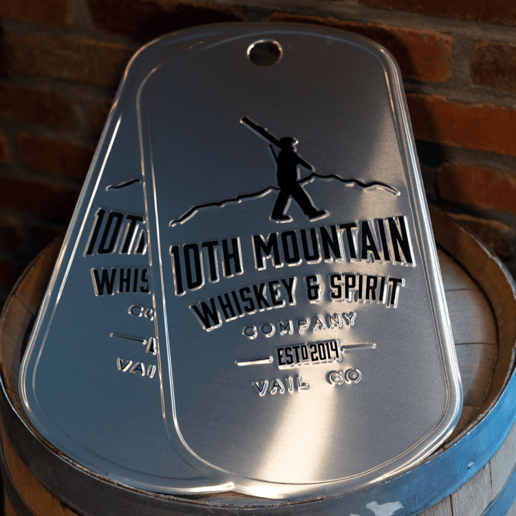 10th Mountain Whiskey Tin Tacker Dog Tag Sign